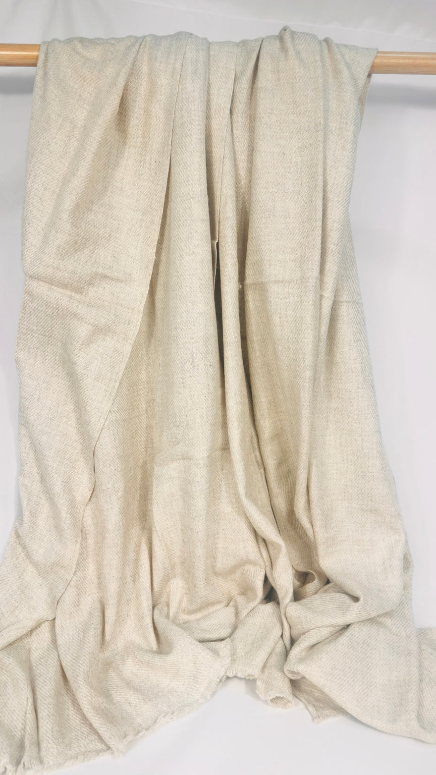 White plain cashmere blanket showing soft folds