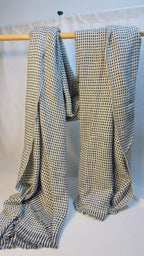 Black and ivory cashmere blanket draped view